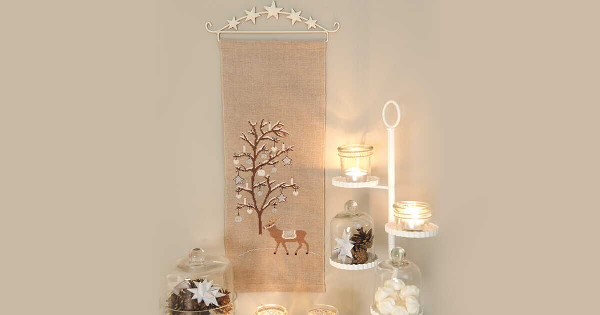 Transformez votre intérieur avec ce panneau mural brodé de Noël